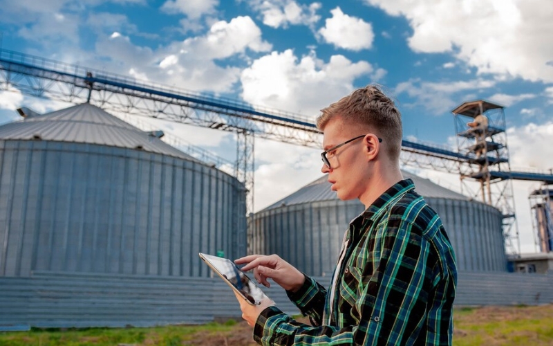 a person monitoring silo logistics